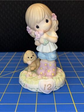 Precious Moments Growing in Grace Age 12 Figurine